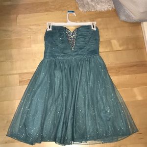 Sparkly blue bedazzled strapless dress